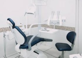 Bright and pristine modern dental chair setup in a high-tech clinic.